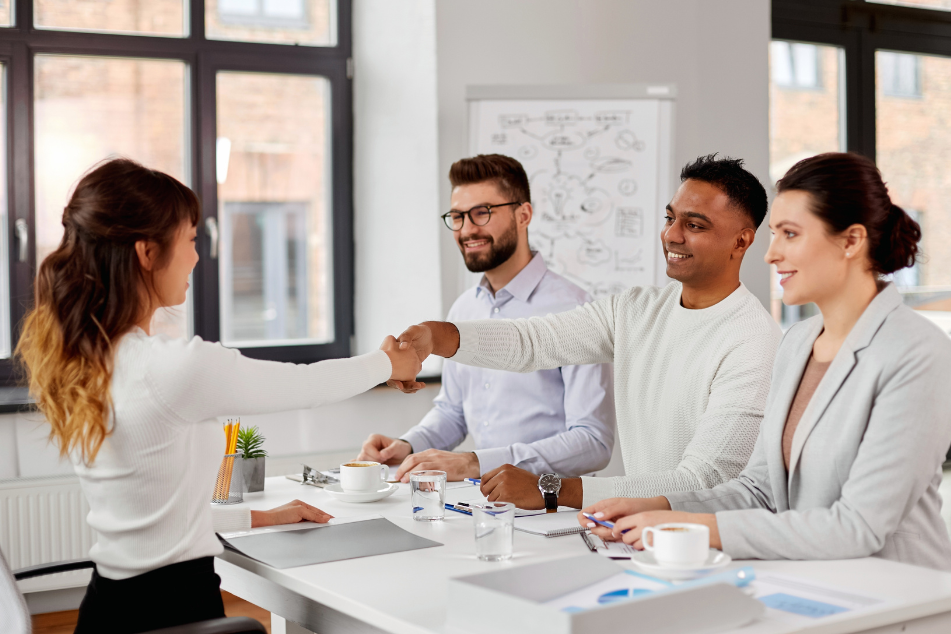 Group of people making a hiring decision.